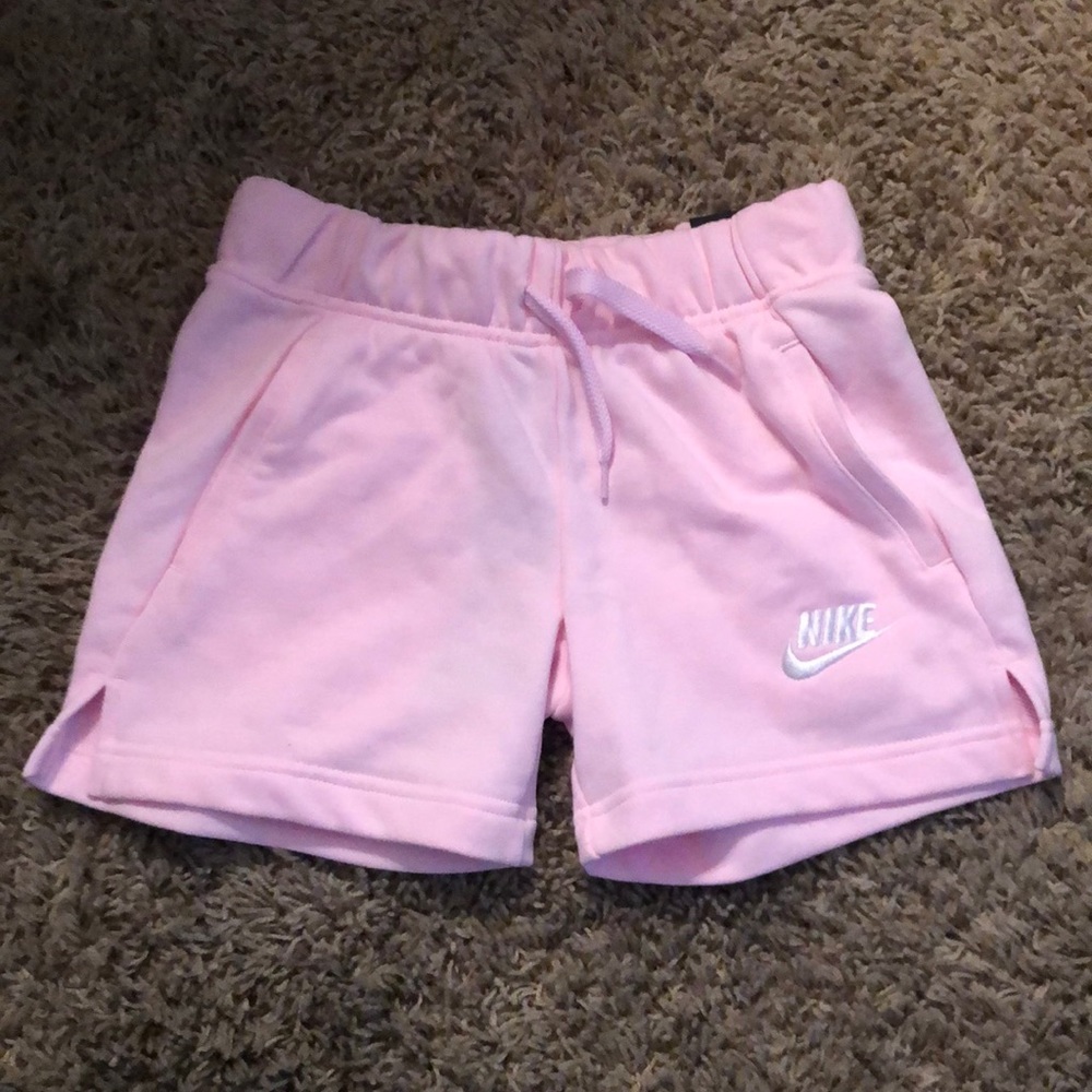 Pink Nike shorts